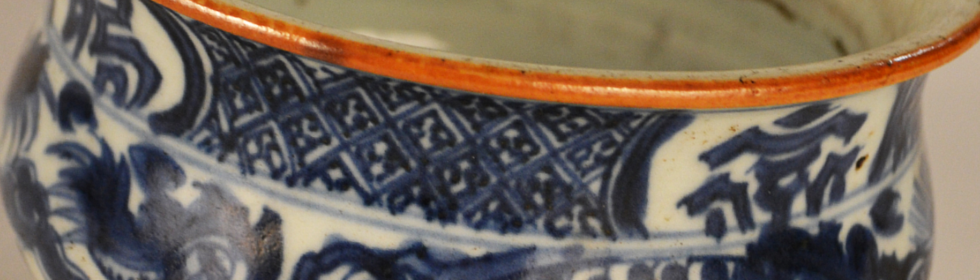Detailed closeup of blue and white pottery